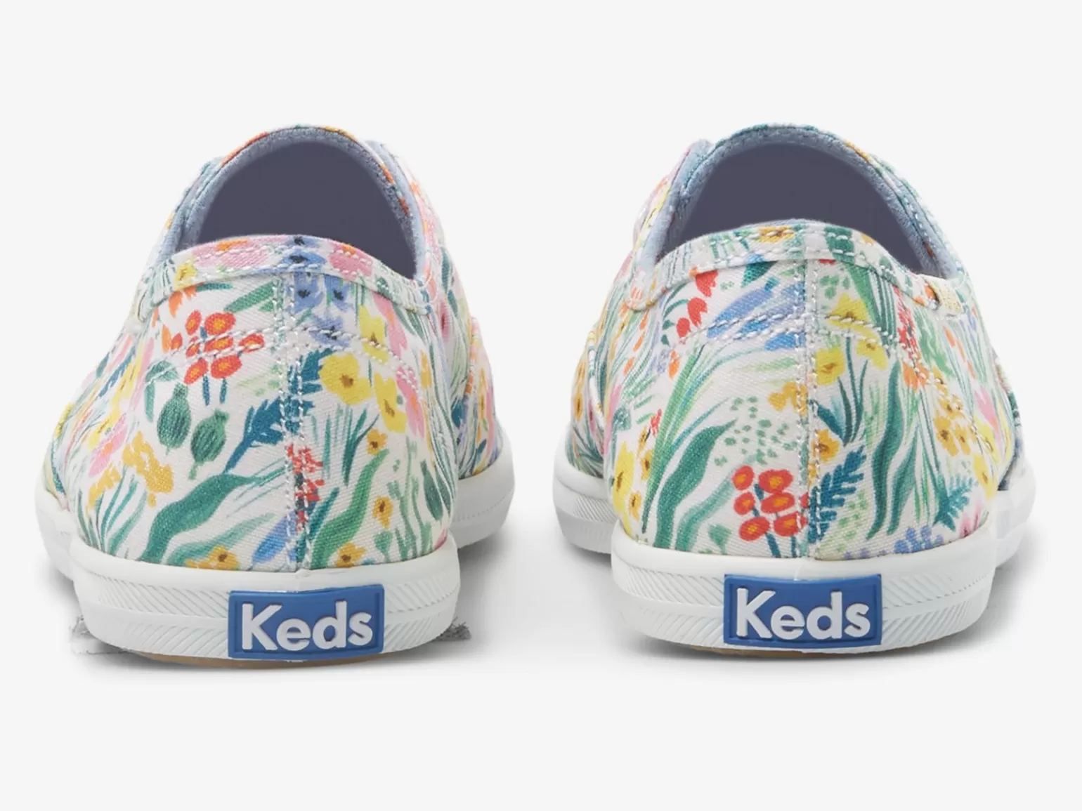 Zapatillas slip-on para mujer de Keds - Diseño Chillax Lea en colaboración con Rifle Paper Co., color blanco con estampado multicolor